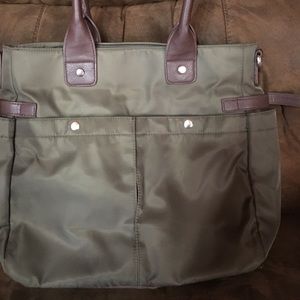 Avon hand bag with lots of pockets in and out